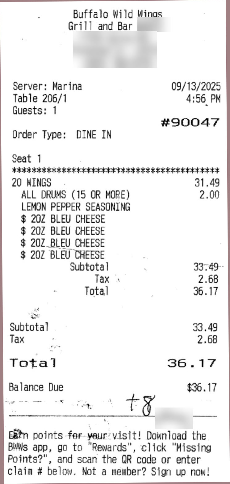 Restaurant receipt with handwritten tip added without a labeled tip line